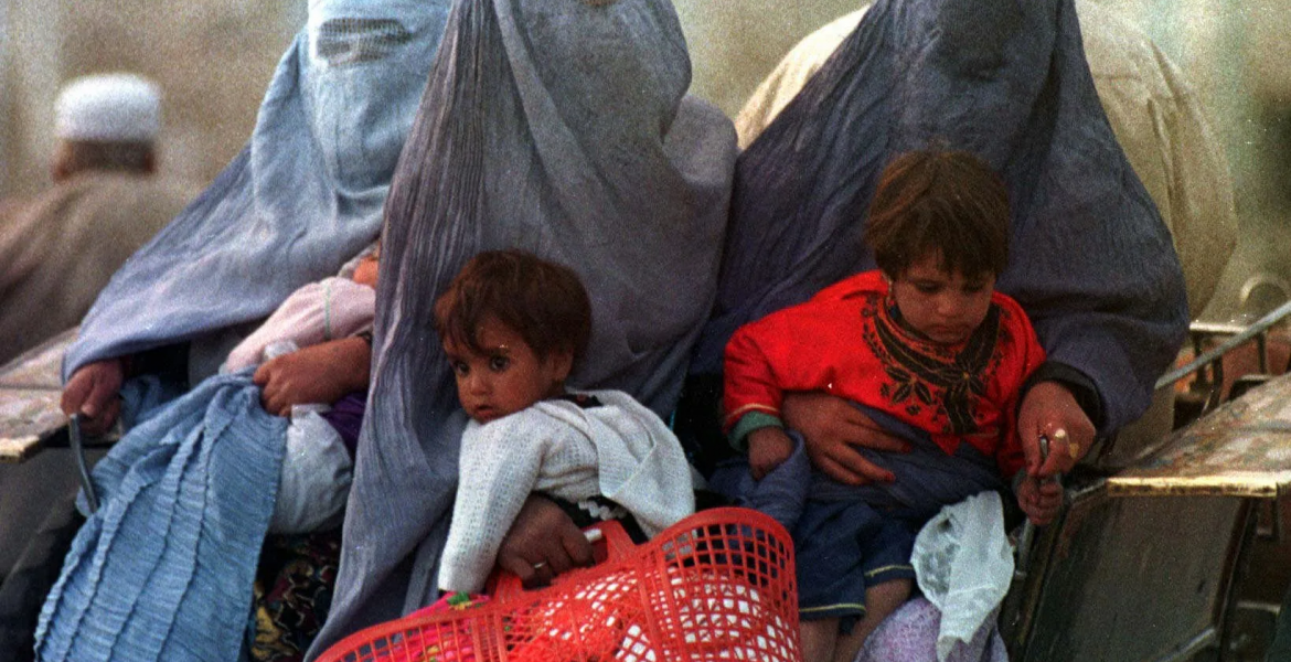 Afghan women and children fleeing the Taliban